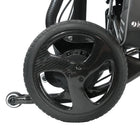 Close-up of a black wheel with a white background
